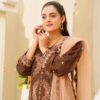 A graceful South Asian woman wearing traditional attire showcasing cultural elegance.